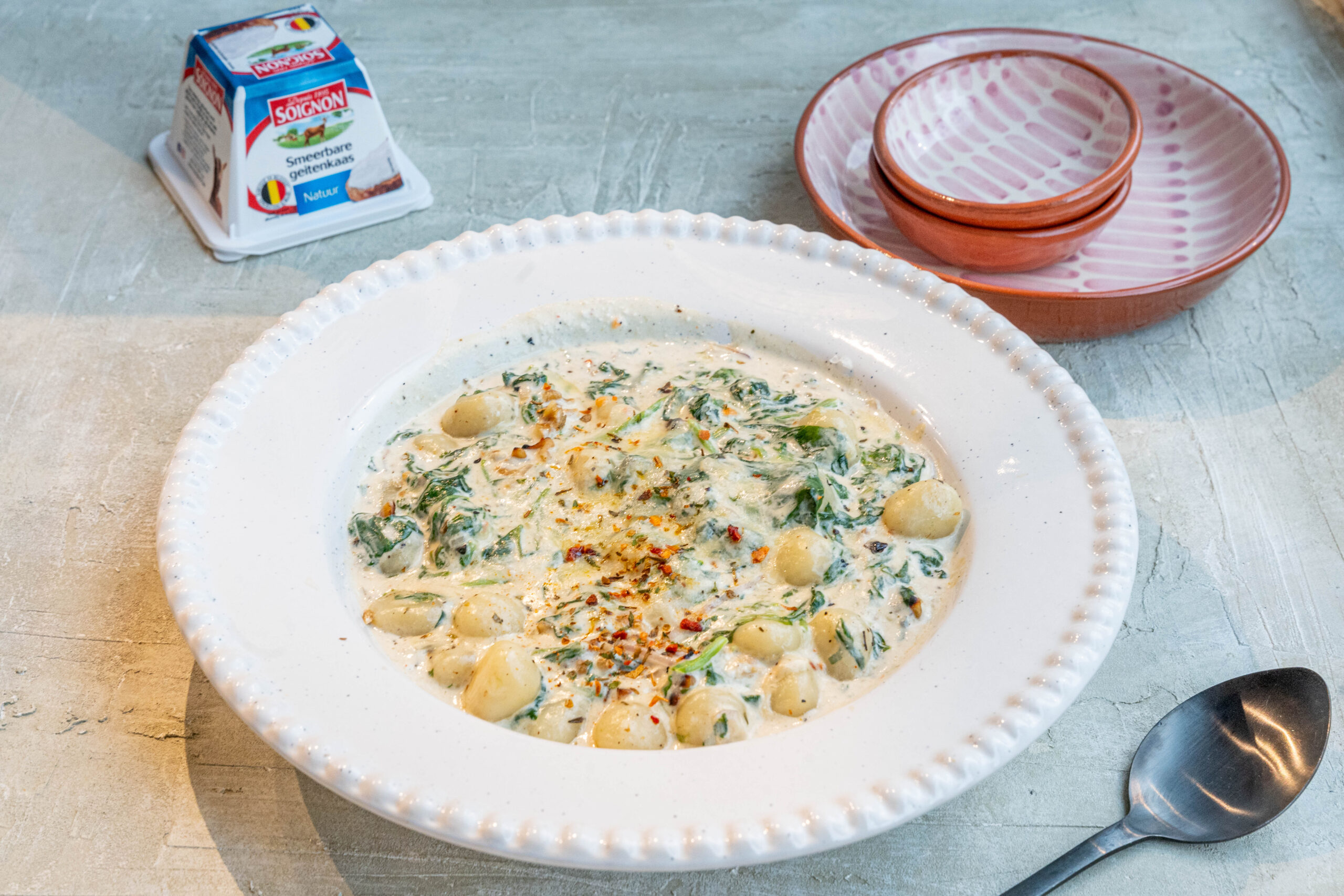 Gnocchi with fresh goat cheese, spinach and walnuts